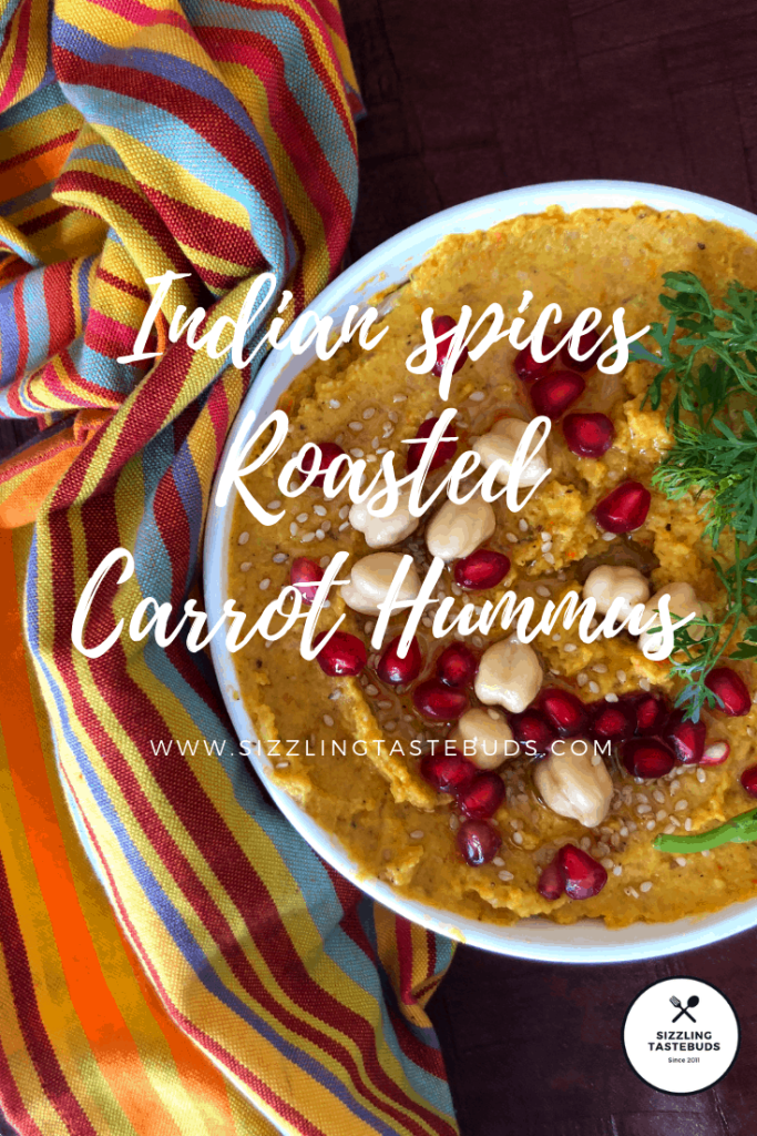 Learn how to make Roasted Carrot Hummus with indian inspired spices. Best served as a dip with crudites / nachos or on a charcuterie board as hors d'oeuvres