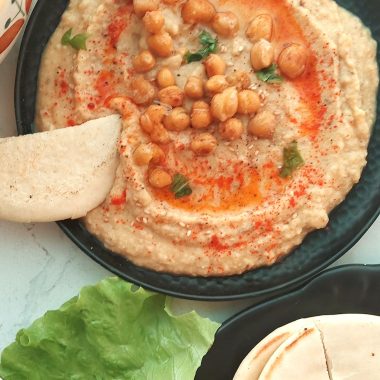 Hummus, a creamy Middle Eastern dip made from blended chickpeas, tahini, olive oil, and spices, offers a delicious and nutritious addition to your table – perfect for dipping, spreading, or enhancing your favorite dishes.