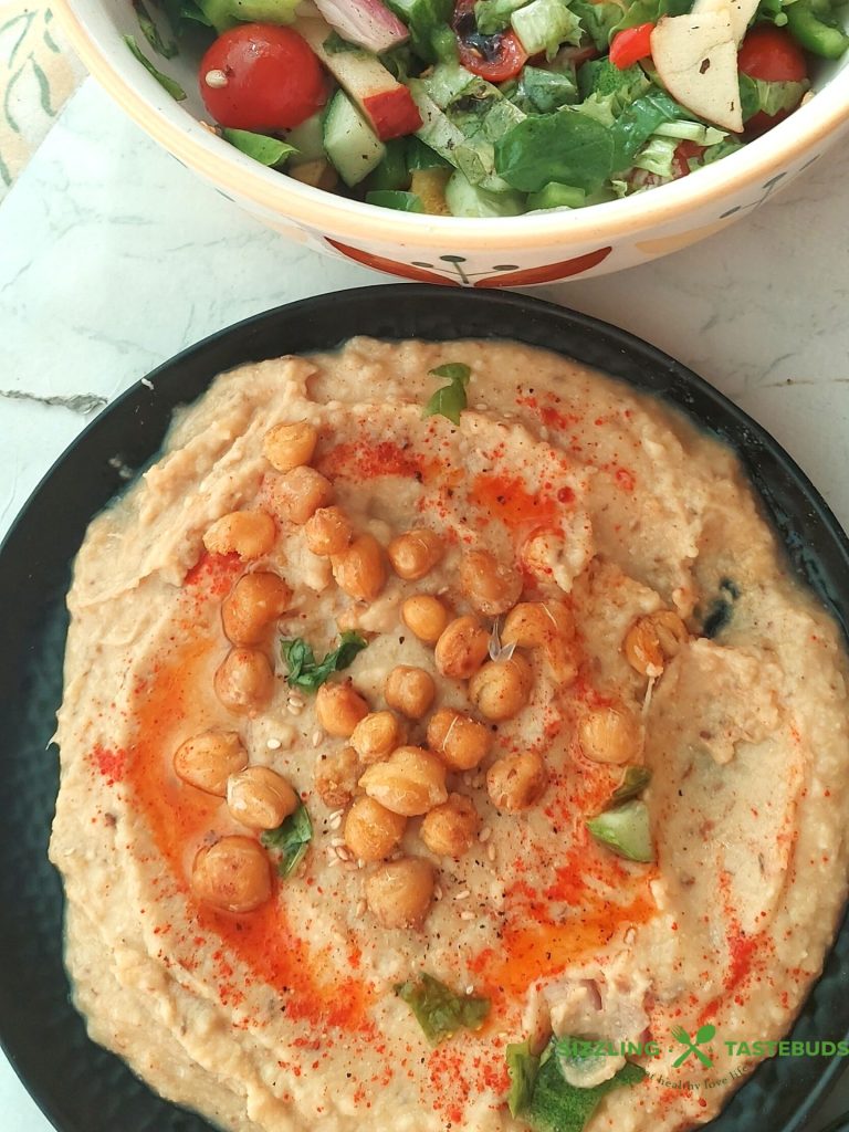 Hummus, a creamy Middle Eastern dip made from blended chickpeas, tahini, olive oil, and spices, offers a delicious and nutritious addition to your table – perfect for dipping, spreading, or enhancing your favorite dishes.