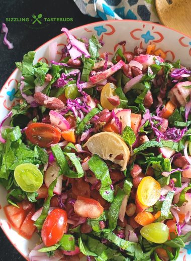 Bean Salad with Spinach and Mint Vinaigrette is a super delish Spring - Summer Salad that is perfect for brunch potluck or a quick filing snack.