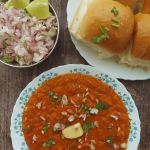 Instant pot Pav Bhaji is a quick, delicious take on the popular Indian Street food. Served with warm dinner rolls / pav and garnish for a sumptuous brunch, snack or dinner.