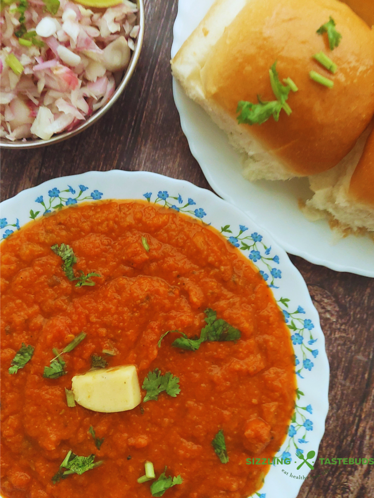 Instant pot Pav Bhaji is a quick, delicious take on the popular Indian Street food. Served with warm dinner rolls / pav and garnish for a sumptuous brunch, snack or dinner.